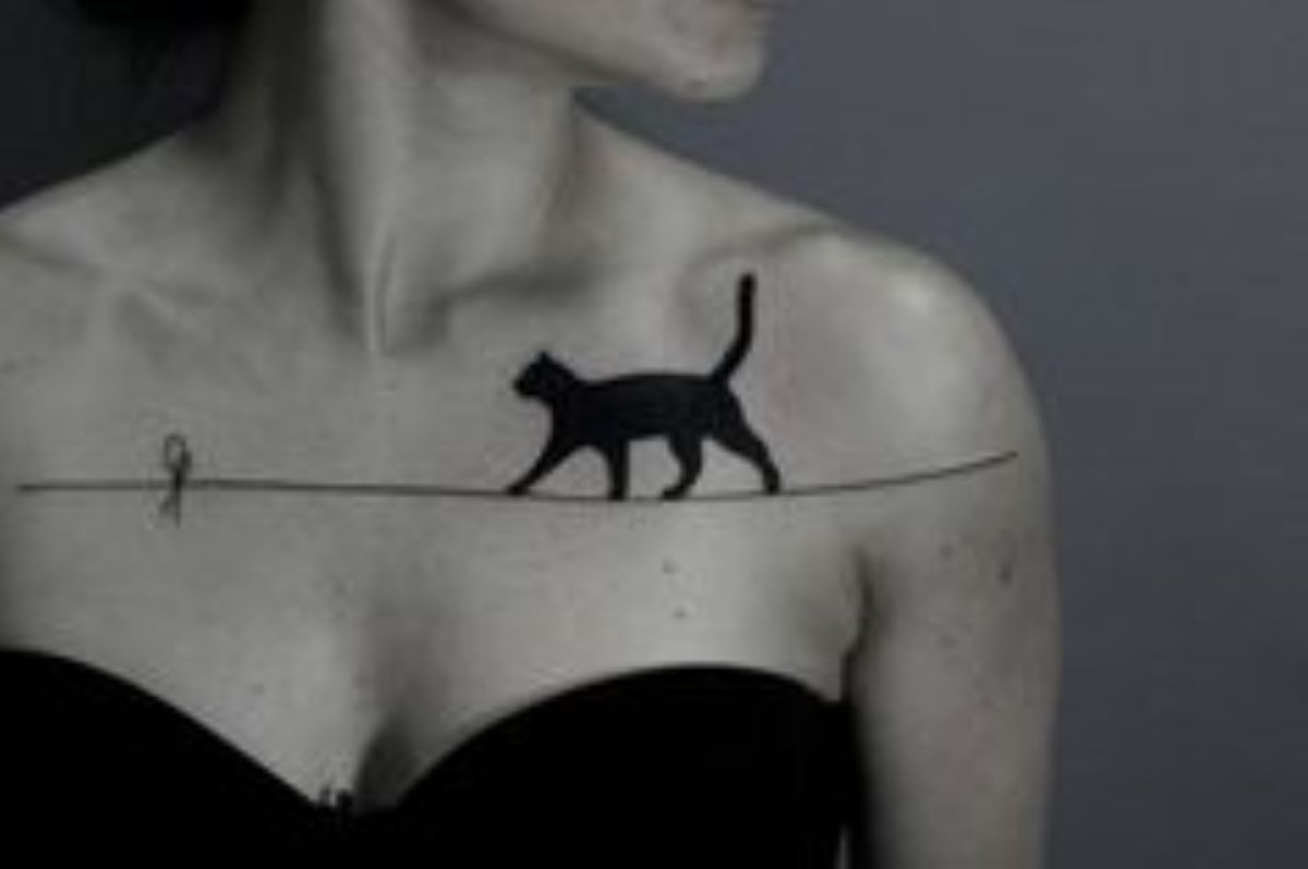 tatoo-gatto-che-cammina-sul-filo